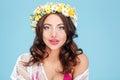 Close-up portrait of a brunette wearing flower diadem