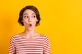 Close up portrait of shocked person unexpected news open mouth watch empty space isolated on yellow color background