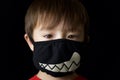 Young boy with mask Royalty Free Stock Photo