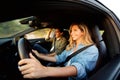 Close up happy couple smiling in car on road trip Royalty Free Stock Photo