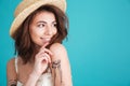 Close up portrait of a smiley young girl in straw hat Royalty Free Stock Photo