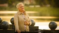 Close up portrait smiling attractive benevolent woman of retirement age. Calm brooding mature lady in casual clothes