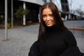 Close-up Portrait Of Smiling Attractive Young Woman Wearing Black In City Royalty Free Stock Photo