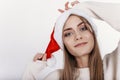 Close-up portrait of smiling blond woman in Santa Claus Hat Royalty Free Stock Photo