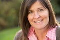 Close Up Portrait Of Smiling Brunette Woman