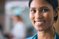 Close Up Portrait Of Smiling Female Doctor Or Nurse Wearing Scrubs And Stethoscope In Hospital Royalty Free Stock Photo