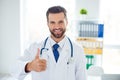 Close up portrait of smiling glad doctor worker recommending the