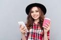 Close up portrait of a smiling pretty woman in hat Royalty Free Stock Photo