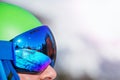 Close-up portrait of a smiling woman in ski helmet and mask Royalty Free Stock Photo