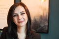 Close up portrait of smiling young business woman looking at camera Royalty Free Stock Photo