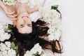 Close up portrait of smiling young caucasian woman 20s old years relaxing in comfy bed at home, happy looking at camera, enjoys Royalty Free Stock Photo