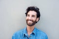 Close up portrait of a smiling young man in blue shirt Royalty Free Stock Photo