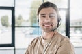 close-up portrait of smiling young support hotline worker Royalty Free Stock Photo