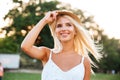 Close up portrait of a smiling young woman in hat Royalty Free Stock Photo