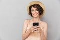 Close up portrait of a smiling young woman in summer hat Royalty Free Stock Photo