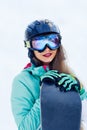 Close up Portrait of snowboarder in Carpathian Mountains, Bukovel Snowboarder. A mountain range reflected in the ski mask. Royalty Free Stock Photo