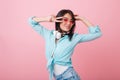 Close-up portrait of stylish asian young woman wears elegant glasses and cotton shirt. Indoor photo of adorable hispanic Royalty Free Stock Photo