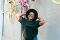 Close-up portrait stylish young African American girl with curly hair in fashionable sunglasses in urban with copy space Royalty Free Stock Photo