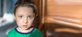 Close up portrait of a surprised european baby boy looking at camera over light background Royalty Free Stock Photo