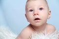 Close-up of Portrait sweet little baby boy, looking up, copy spa