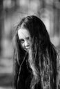Close-up portrait of teen girl outdoor. Black and white photo. Royalty Free Stock Photo