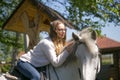 Close-up portrait of teenage girl and horse Royalty Free Stock Photo