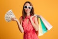 Close-up portrait of thinking pretty woman in sunglasses holding Royalty Free Stock Photo