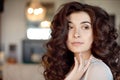 Close up portrait of thoughtful woman with gorgeous long hair Royalty Free Stock Photo