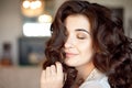 Close up portrait of thoughtful woman with gorgeous long hair