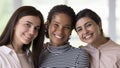 Close up portrait of three beautiful multiethnic girls Royalty Free Stock Photo
