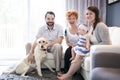 Close up portrait of three generations of women being close, grandmother, mother and baby daughter at home Royalty Free Stock Photo