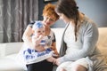 Close up portrait of three generations of women being close, grandmother, mother and baby daughter at home Royalty Free Stock Photo