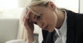 Close-up Portrait of a Tired and Disheartened Woman in Business Attire