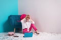 Close up portrait of tired girl with dissatisfied face expression, looking at her notebook screen with copy space for your adverti Royalty Free Stock Photo