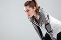 Close up portrait of a tired young sportswoman in earphones Royalty Free Stock Photo