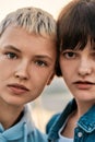 Close up portrait of two attractive young women with short hair looking at camera, Young lesbian couple spending time Royalty Free Stock Photo