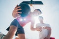 Close up portrait of two basketball players while the push each other for ball possession Royalty Free Stock Photo