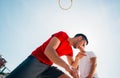 Close up portrait of two basketball players while the push each other for ball possession Royalty Free Stock Photo