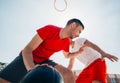 Close up portrait of two basketball players while the push each other for ball possession Royalty Free Stock Photo