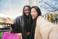 Close up portrait of two happy young women doing a selfie portrait looking at camera. Front view of a couple of Royalty Free Stock Photo