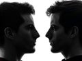 Close up portrait two men twin brother friends silhouette Royalty Free Stock Photo