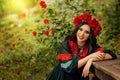 Close-up portrait Ukrainian happy girl looks at camera. Authentic woman smiling face. National ethnic vintage costume
