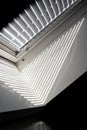 A close up portrait of a velux roof window with a closed jalousie in it to keep the warmth out or to keep the light from entering