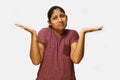 Woman with bad face expression and wide open hand on white background