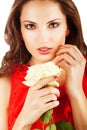 Close-up portrait of woman in red dress with white rose Royalty Free Stock Photo