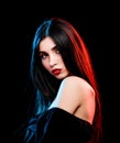 Close-up portrait woman with red lips in blue and red light Royalty Free Stock Photo