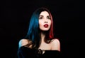 Close-up portrait woman with red lips in blue and red light Royalty Free Stock Photo