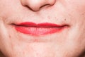 Close-up portrait of a woman wearing bright red lipstick Royalty Free Stock Photo