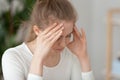 Close up frustrated woman sitting at work