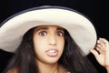 Close up portrait of a young african american girl with sun hat Royalty Free Stock Photo